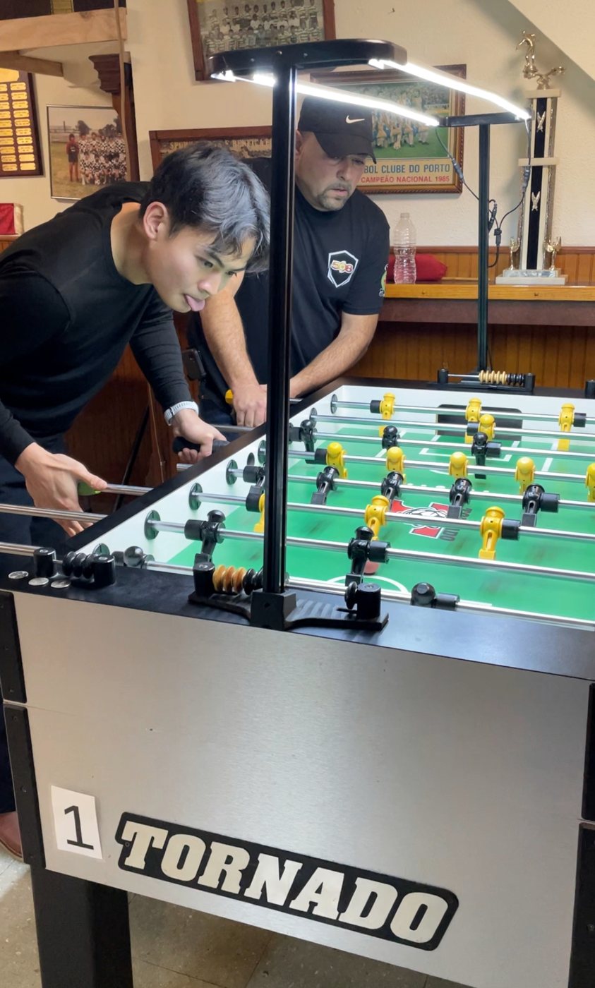 At a foosball table