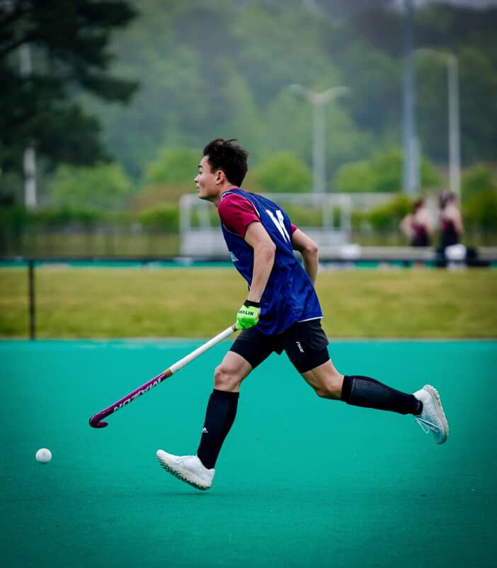 Playing field hockey