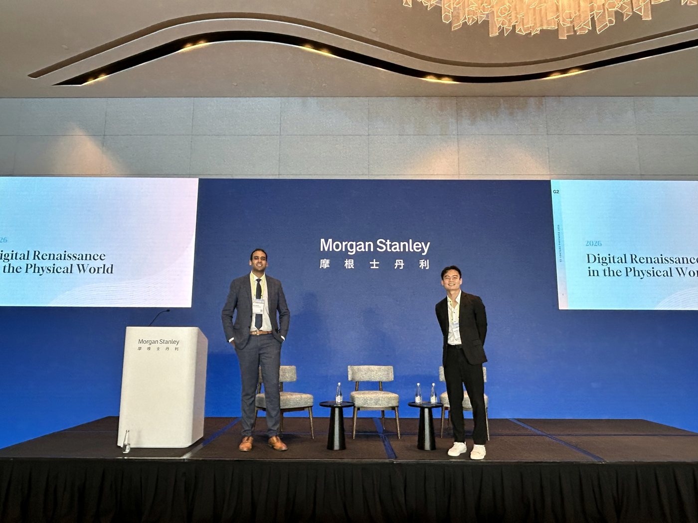 On stage at a conference
